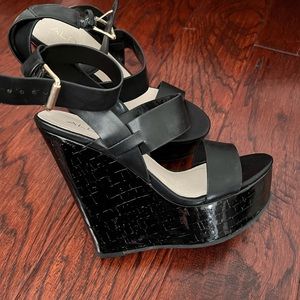 Black ALDO platform wedges